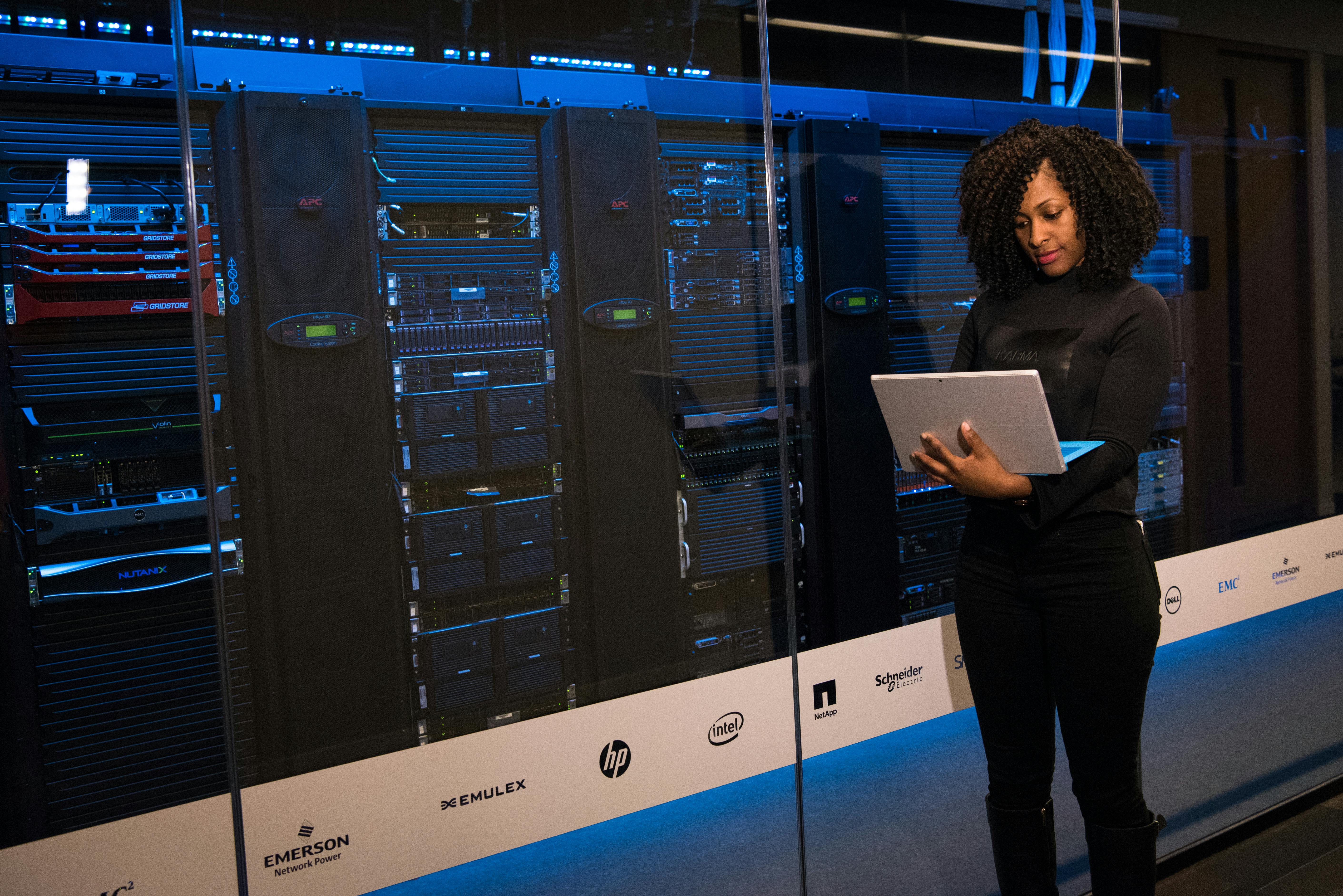 Technician working in server room